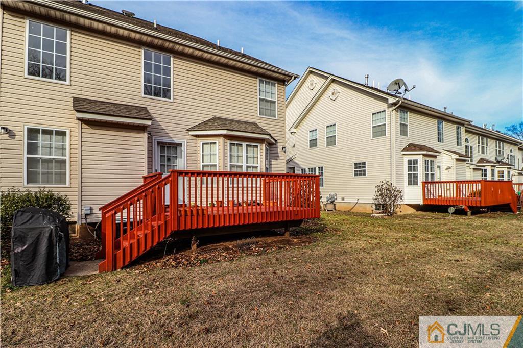 30 Hawthorne Road North Brunswick, NJ 08902 - Photo 36 of 40 a view of a house with a wooden deck