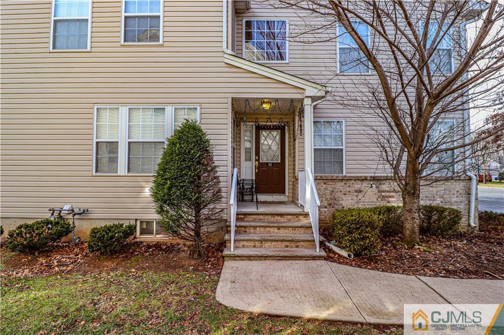 30 Hawthorne Road North Brunswick, NJ 08902 - Photo 40 of 40 a front view of a house with garden