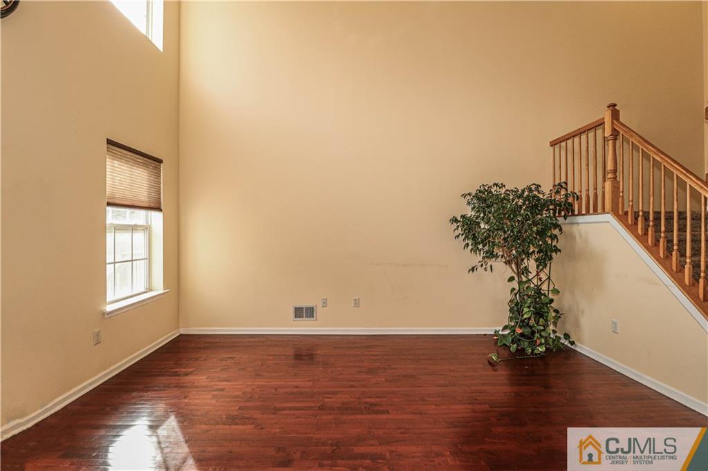 30 Hawthorne Road North Brunswick, NJ 08902 - Photo 10 of 40 a view of a room with a window and wooden floor