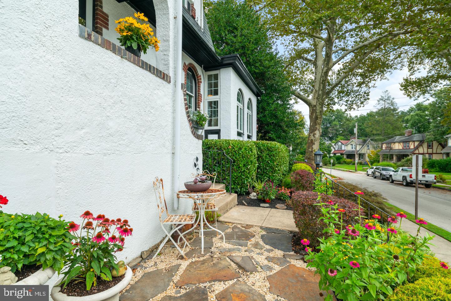 54 Wellington Road Ardmore, PA 19003 - Photo 2 of 26 a view of a garden with flowers and flowers