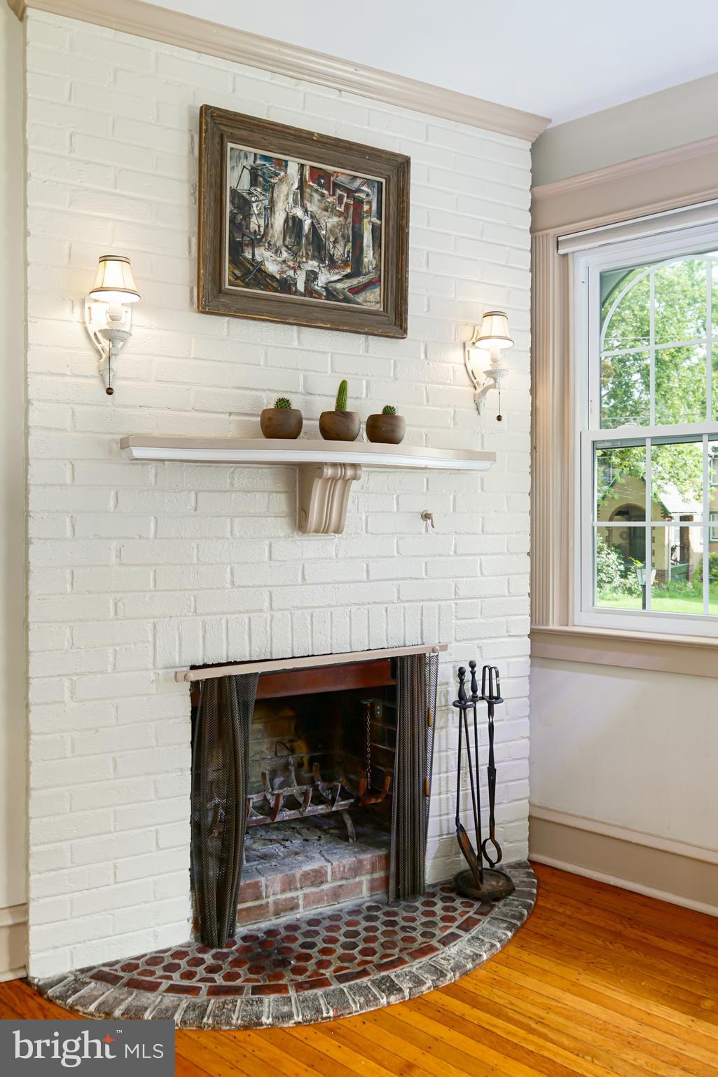 54 Wellington Road Ardmore, PA 19003 - Photo 16 of 26 a view of a livingroom with wooden floor and a fireplace