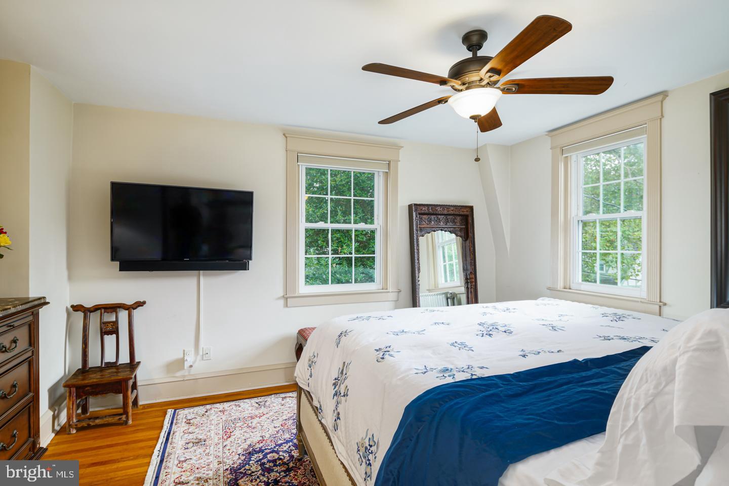 54 Wellington Road Ardmore, PA 19003 - Photo 19 of 26 a bedroom with a bed and a flat screen tv