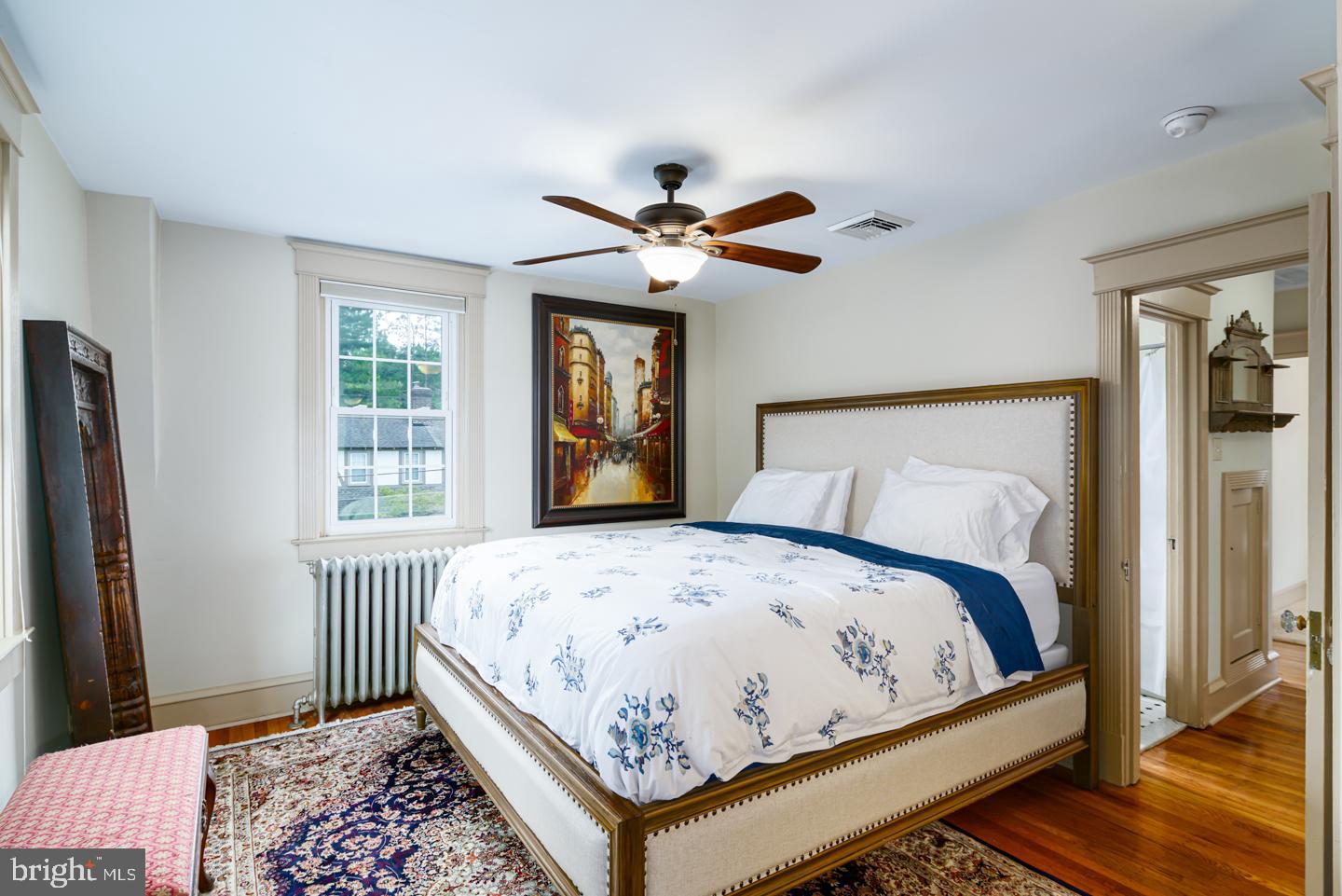 54 Wellington Road Ardmore, PA 19003 - Photo 20 of 26 a bedroom with a bed and a window
