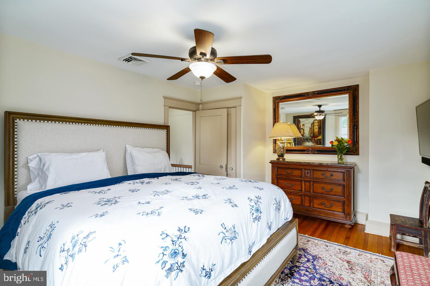 54 Wellington Road Ardmore, PA 19003 - Photo 21 of 26 a bedroom with a bed and a dresser in it
