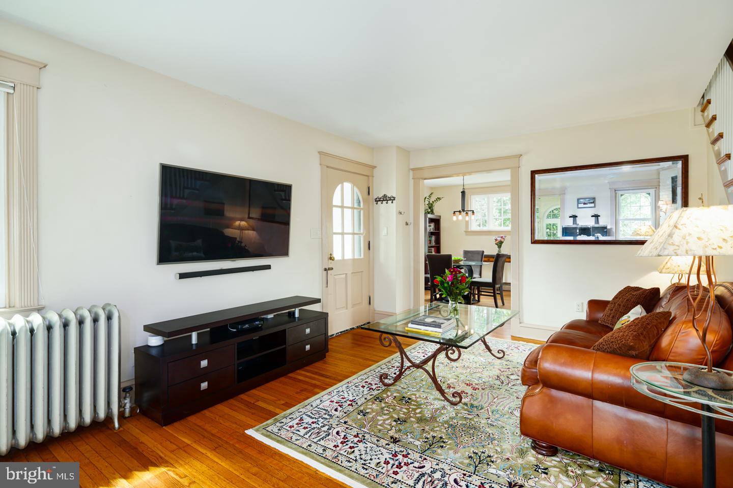54 Wellington Road Ardmore, PA 19003 - Photo 9 of 26 a living room with furniture and a flat screen tv