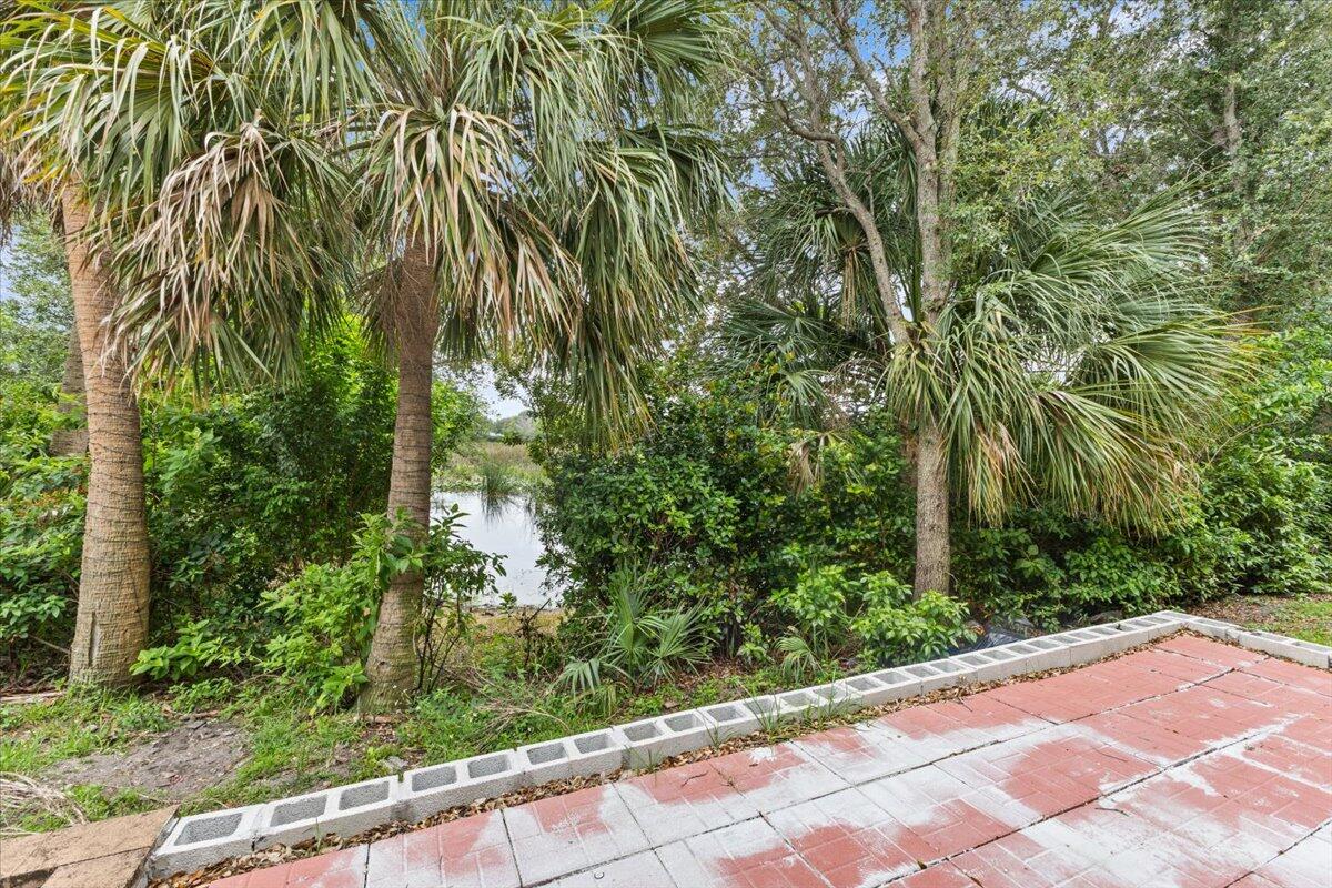 2227 Oakmont Drive Riviera Beach, FL 33404 - Photo 35 of 43 a view of a garden