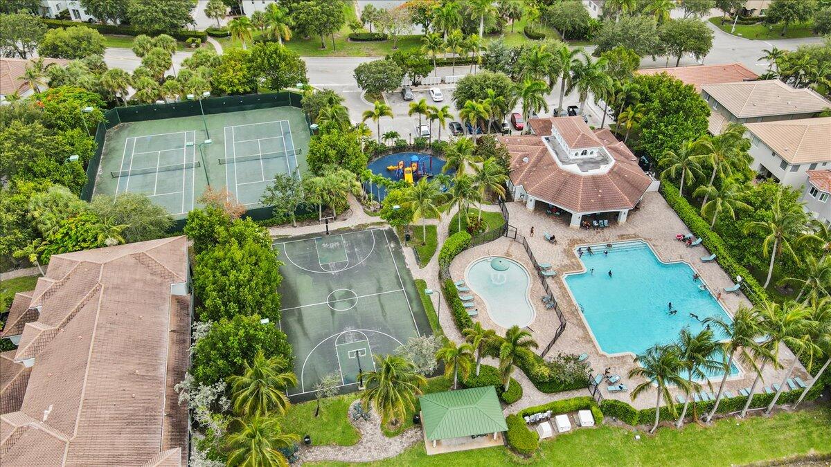 2227 Oakmont Drive Riviera Beach, FL 33404 - Photo 41 of 43 an aerial view of a house with a garden