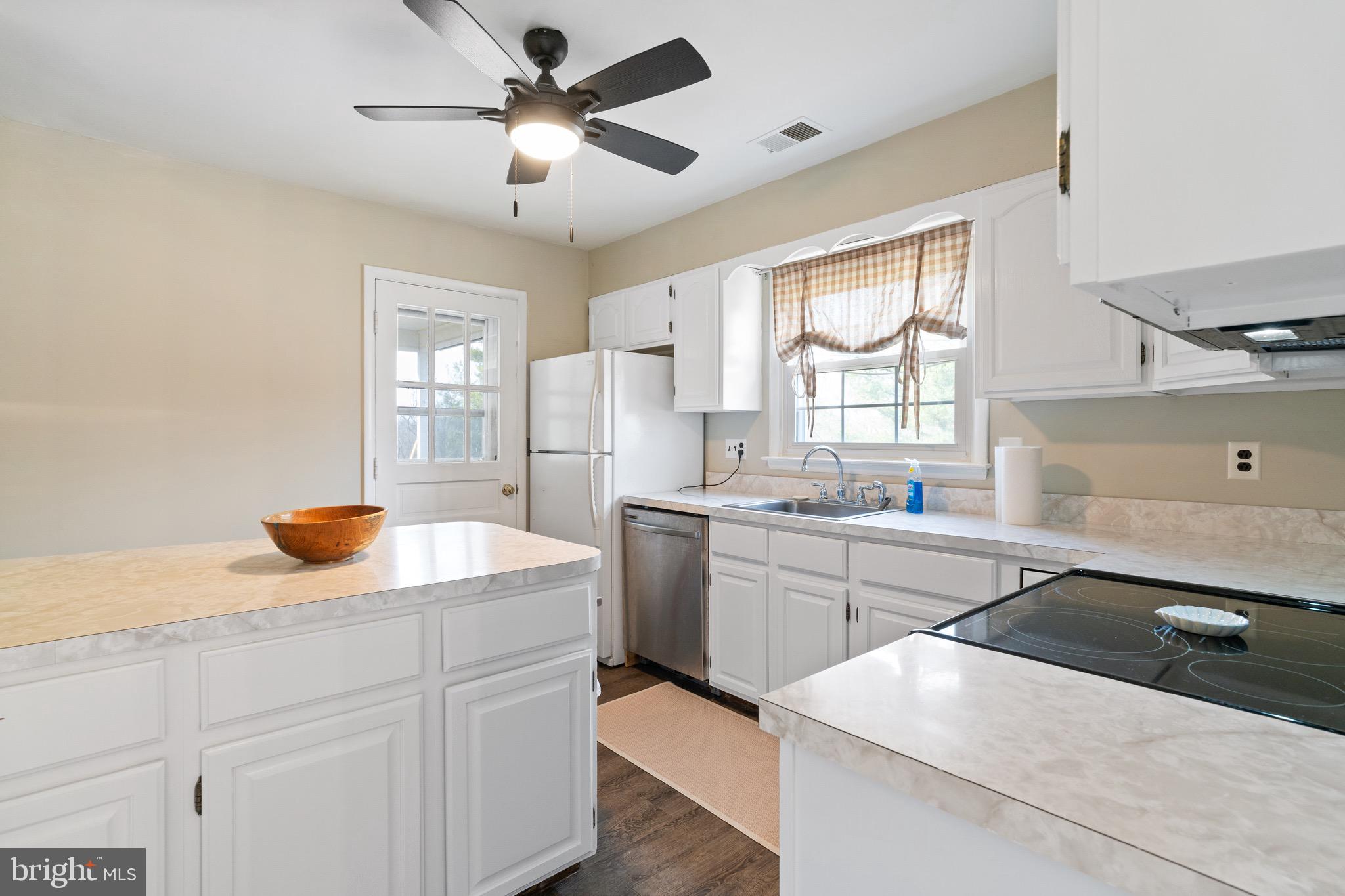 1204 Random Ridge Road Westminster, MD 21157 - Photo 11 of 33 a kitchen with a sink stove and window