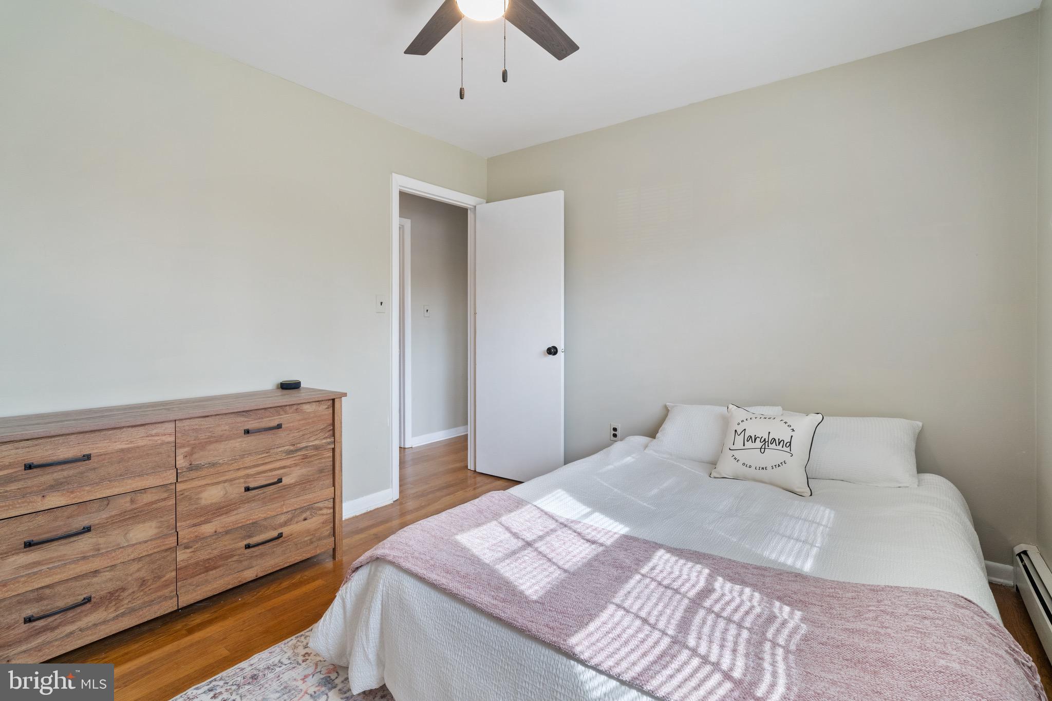 1204 Random Ridge Road Westminster, MD 21157 - Photo 17 of 33 a bedroom with a bed and a dresser