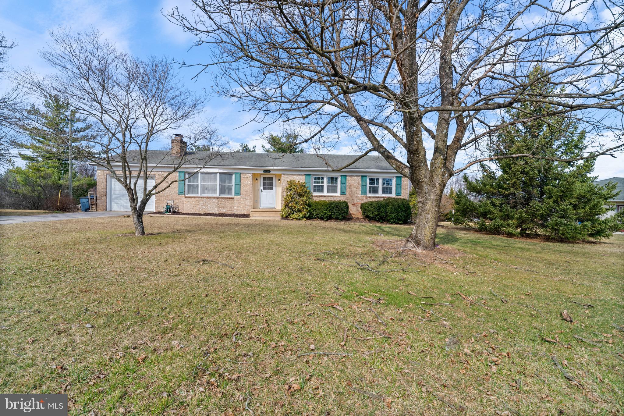 1204 Random Ridge Road Westminster, MD 21157 - Photo 30 of 33 a front view of a house with a yard