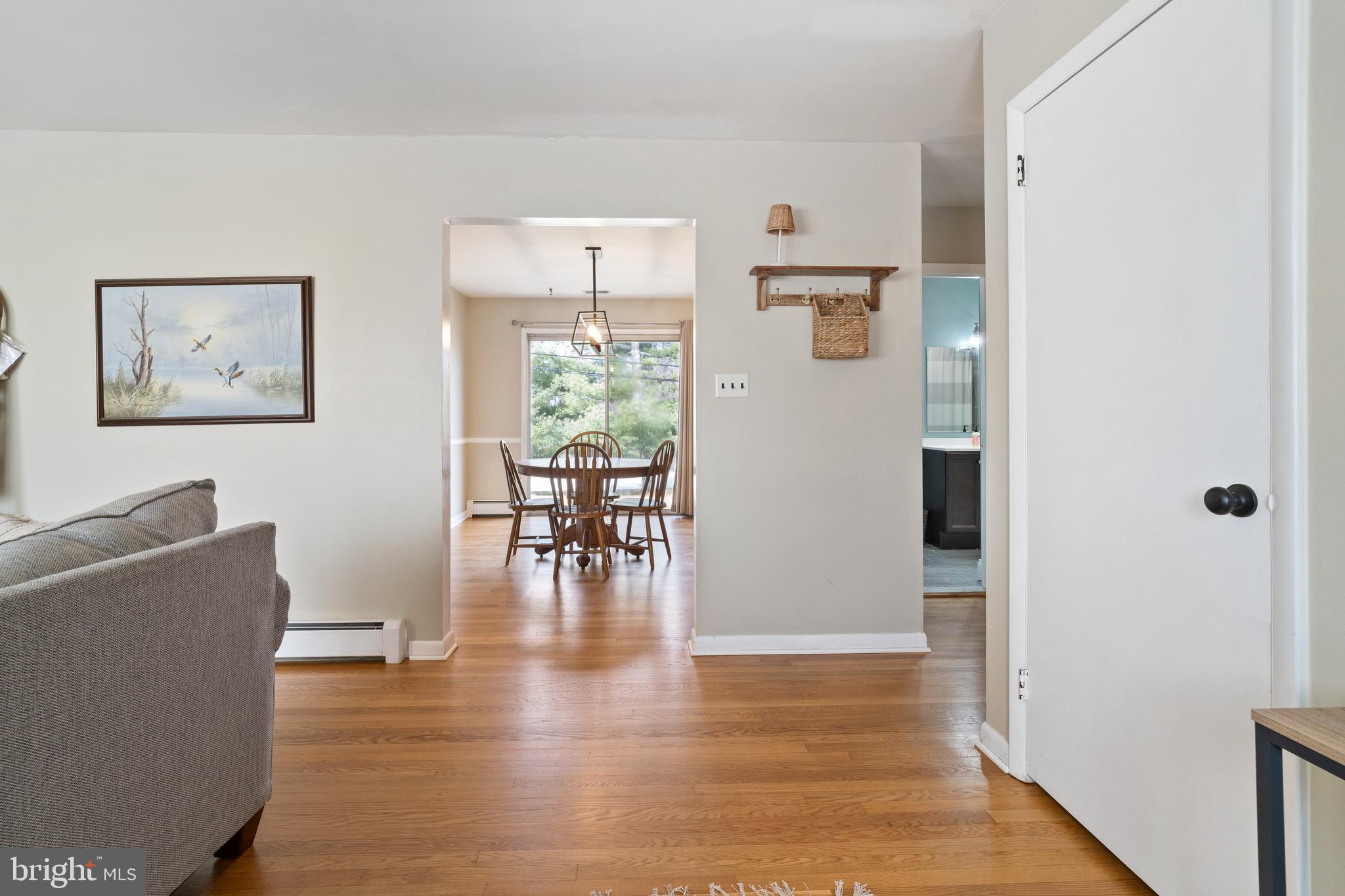 1204 Random Ridge Road Westminster, MD 21157 - Photo 3 of 33 a view of livingroom with furniture and wooden floor