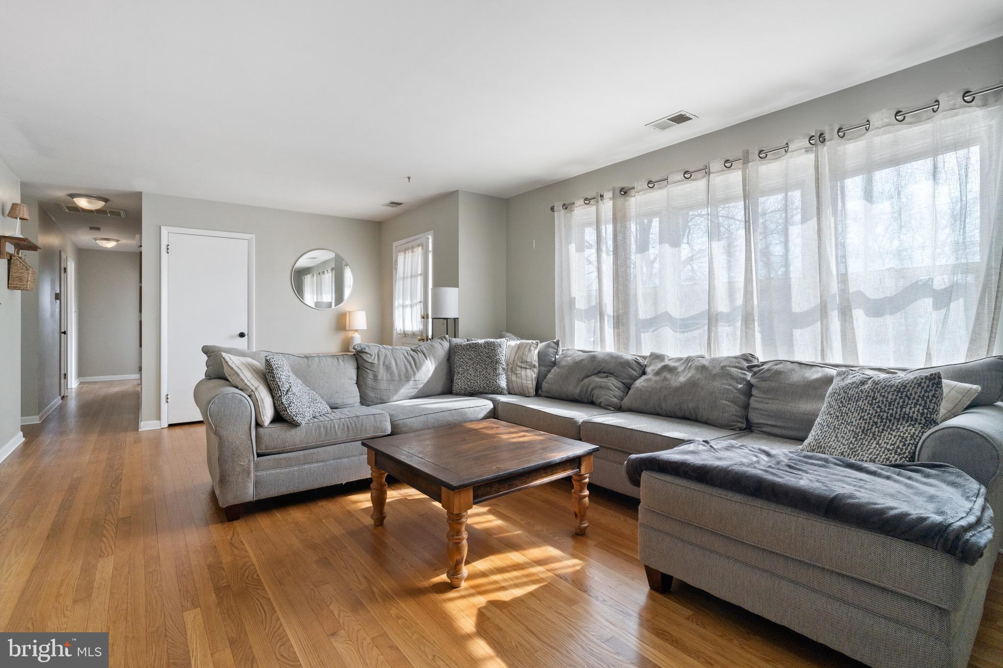 1204 Random Ridge Road Westminster, MD 21157 - Photo 6 of 33 a living room with furniture and a large window