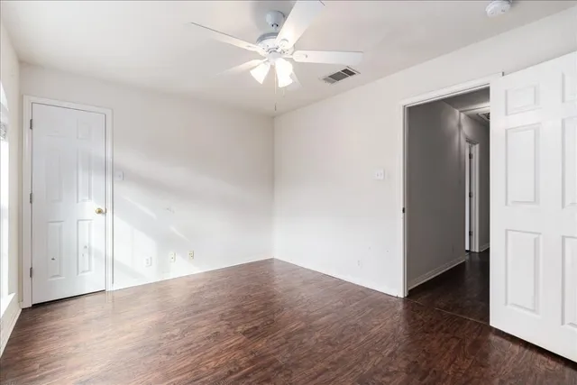 a view of a swimming pool with a patio and a yard