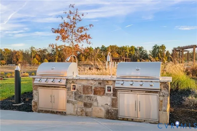 an aerial view of a house with a garden