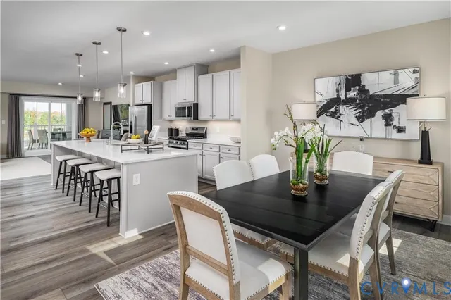 a view of a dining room with furniture