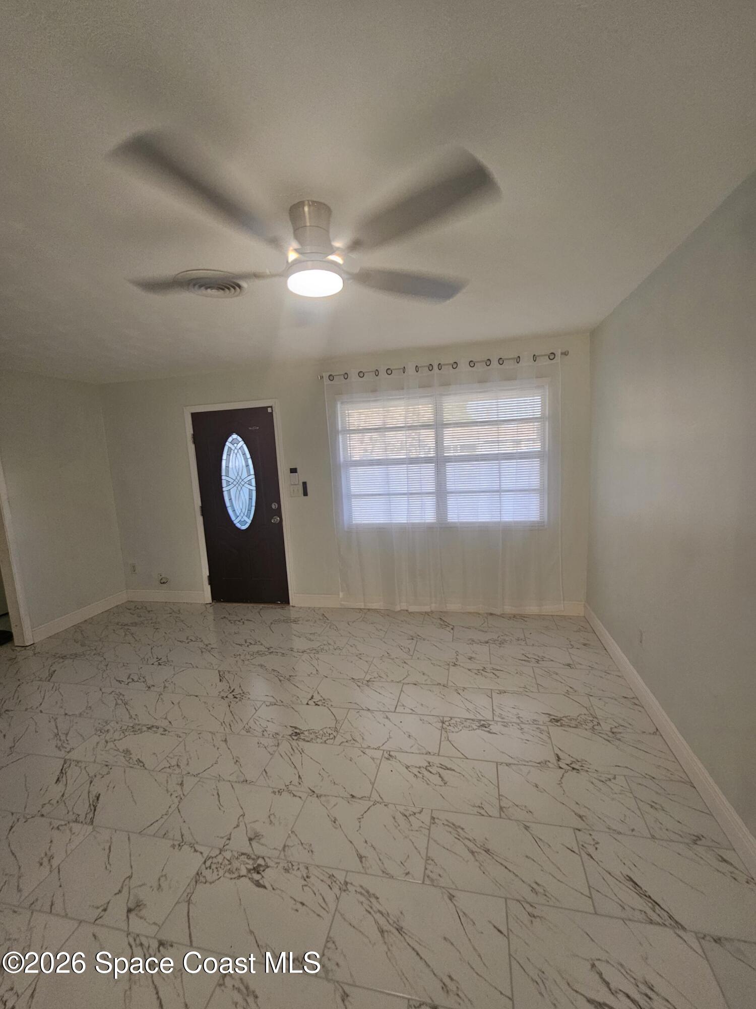 1616 Elizabeth Street Melbourne, FL 32901 - Photo 5 of 14 a view of a livingroom with wooden floor