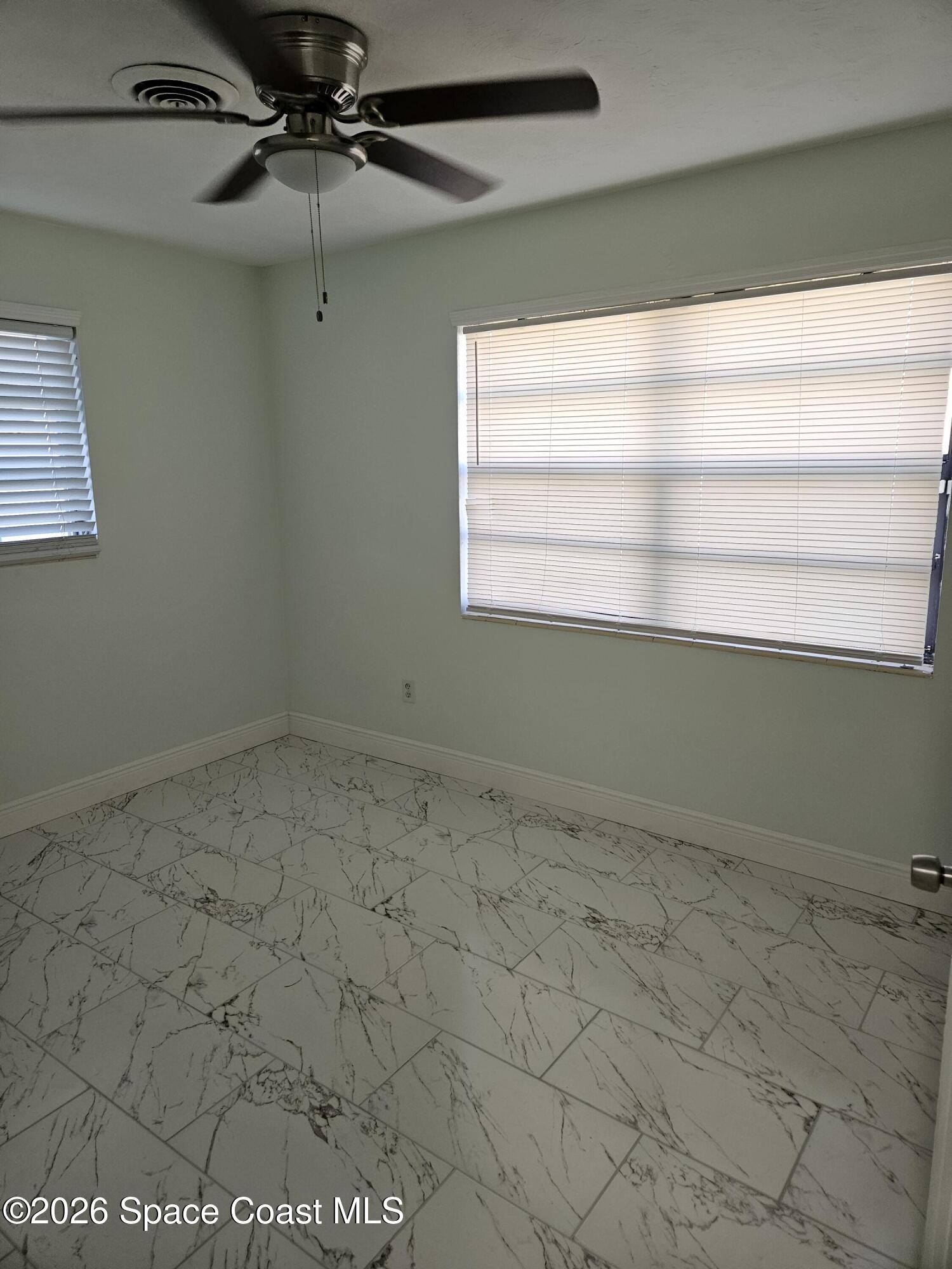 1616 Elizabeth Street Melbourne, FL 32901 - Photo 8 of 14 a view of a room with a window