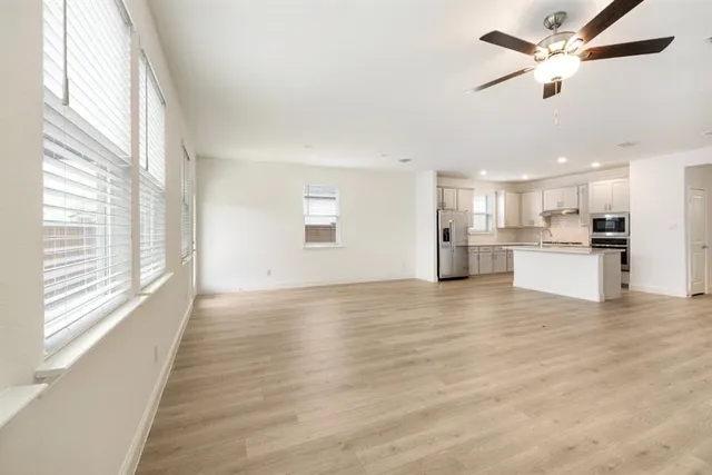 a bathroom with a shower and a sink