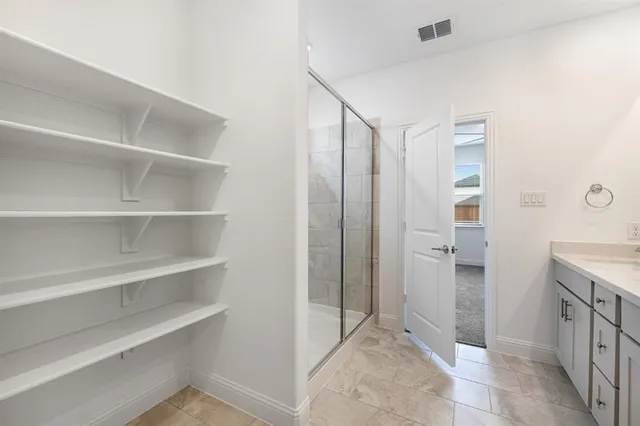 a bathroom with a sink a toilet and bathtub