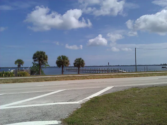 a view of a swimming pool and an outdoor space