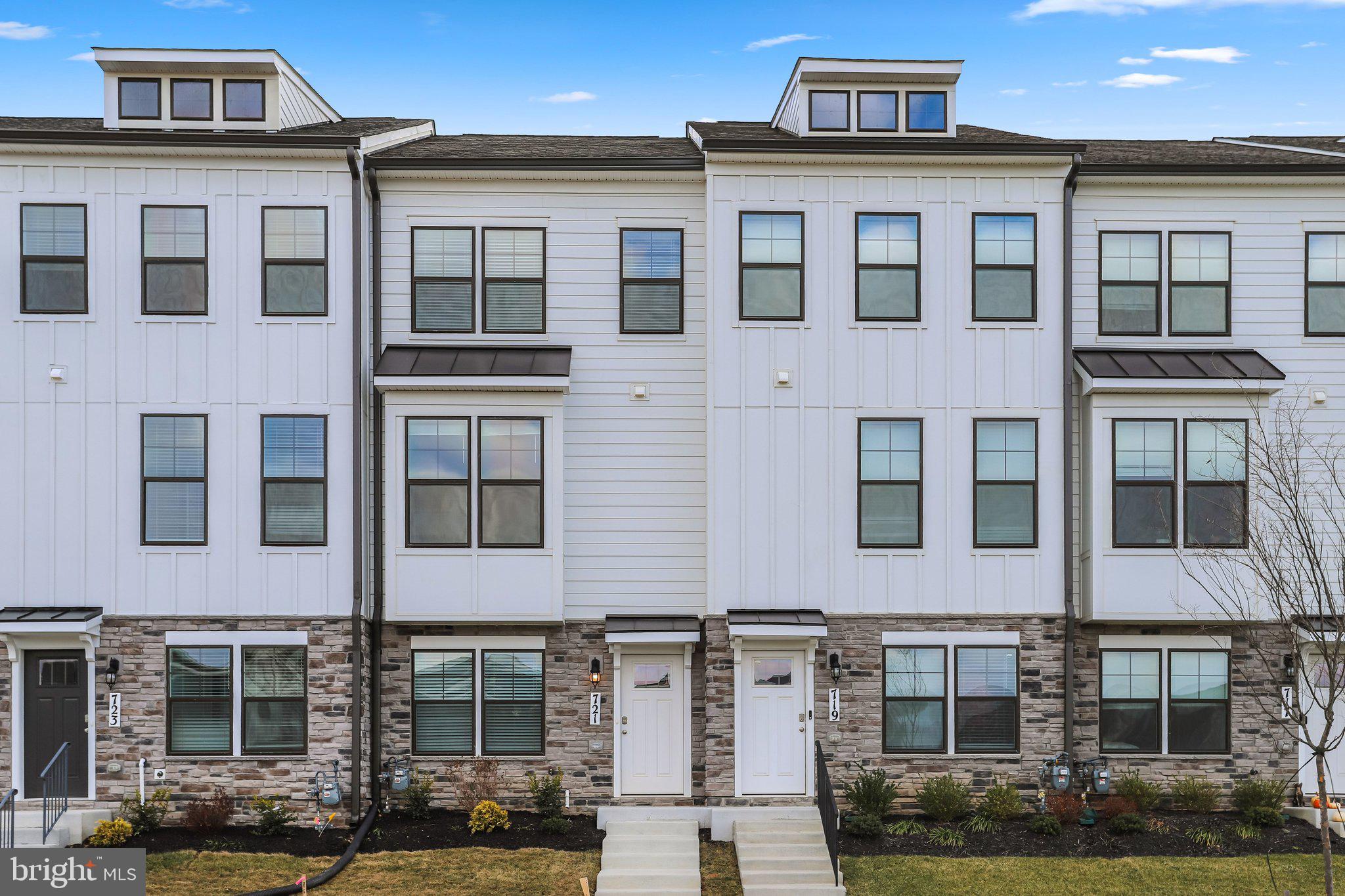 721 Courier Lane Frederick, MD 21701 - Photo 2 of 61 a front view of a building with windows