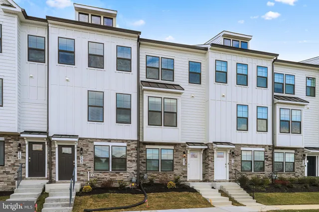 a front view of a building with balcony