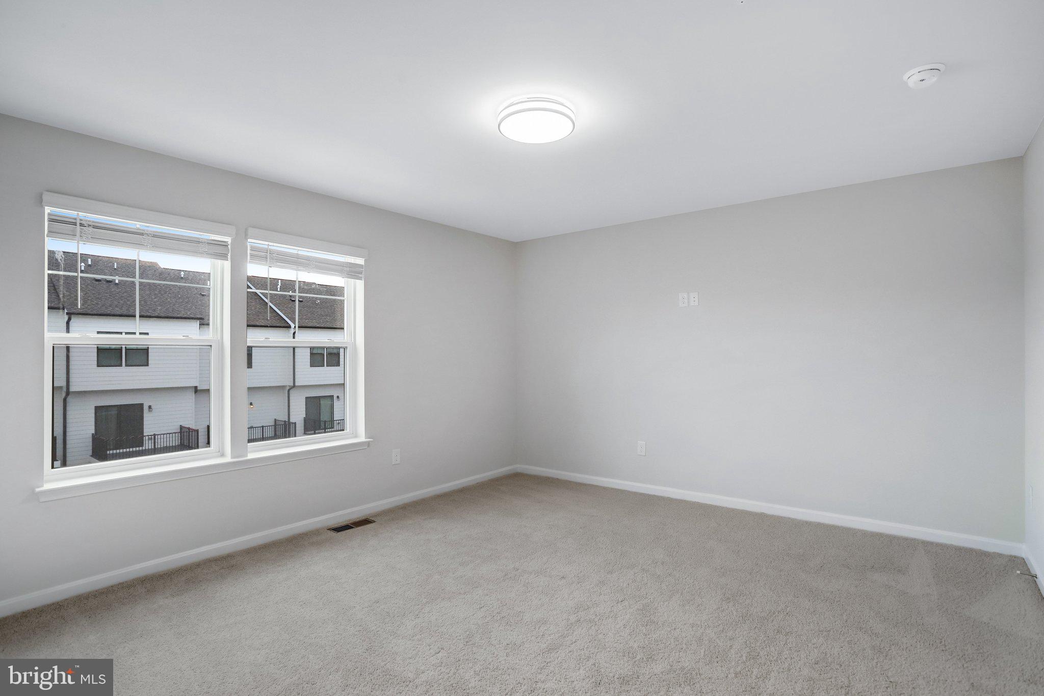 721 Courier Lane Frederick, MD 21701 - Photo 32 of 61 an empty room with a window