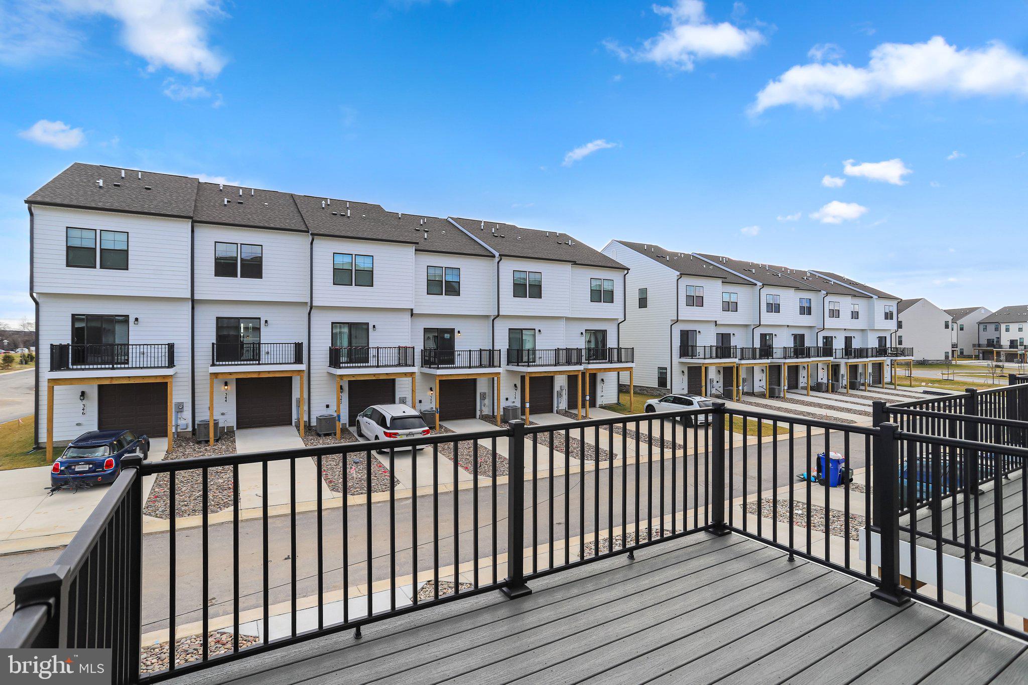 721 Courier Lane Frederick, MD 21701 - Photo 53 of 61 a view of a brick building from a balcony