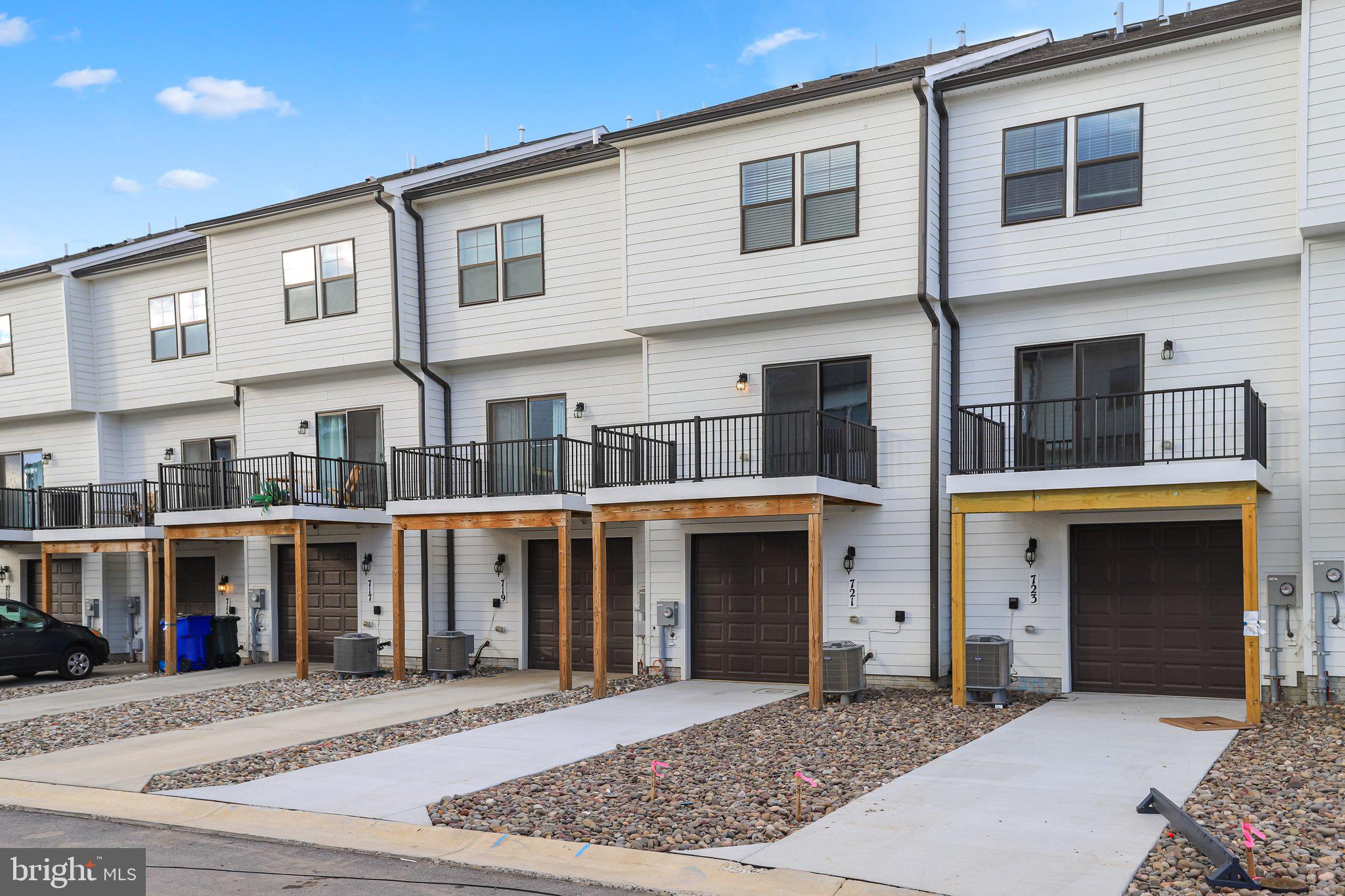 721 Courier Lane Frederick, MD 21701 - Photo 57 of 61 a front view of a building with windows