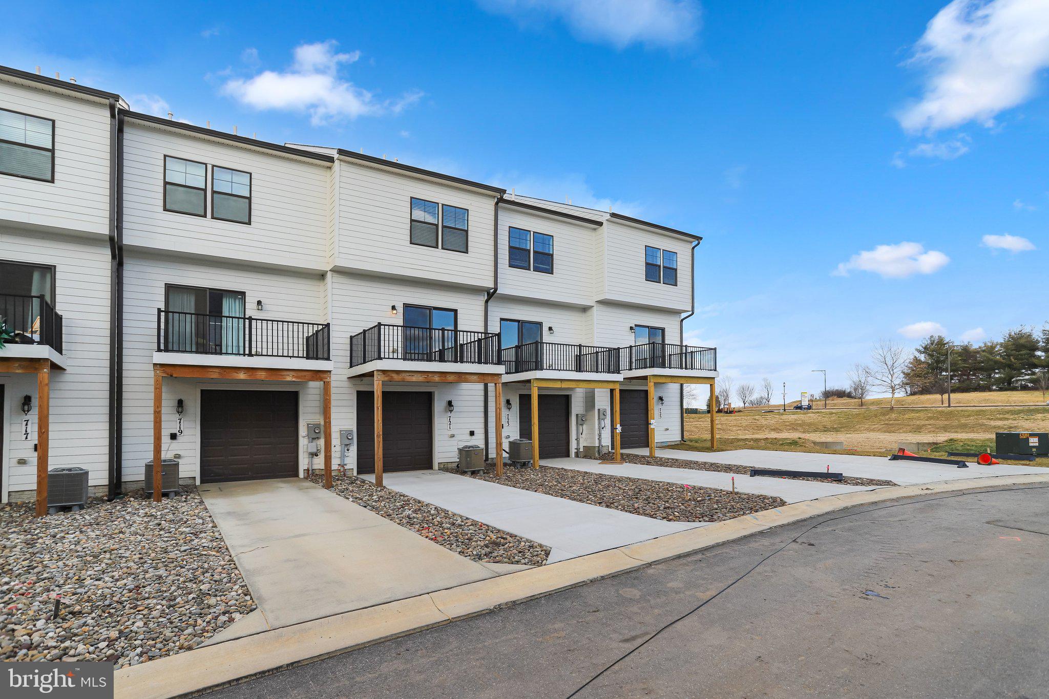 721 Courier Lane Frederick, MD 21701 - Photo 59 of 61 a view of an ocean with a building in the background