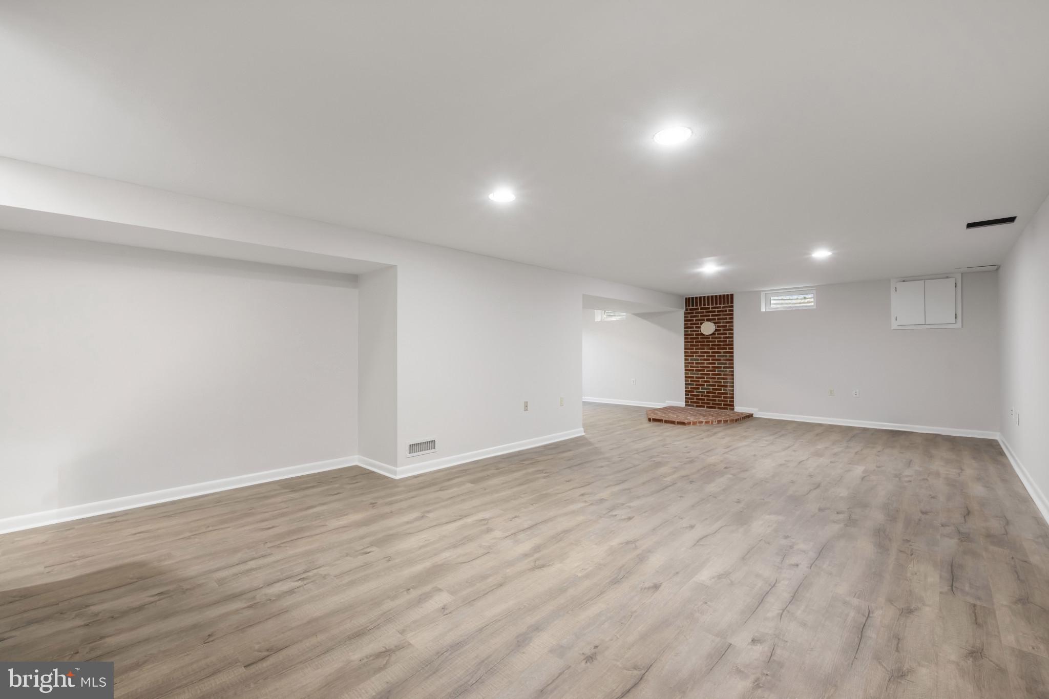 2106 Schuster Road Jarrettsville, MD 21084 - Photo 23 of 28 a view of an empty room with wooden floor