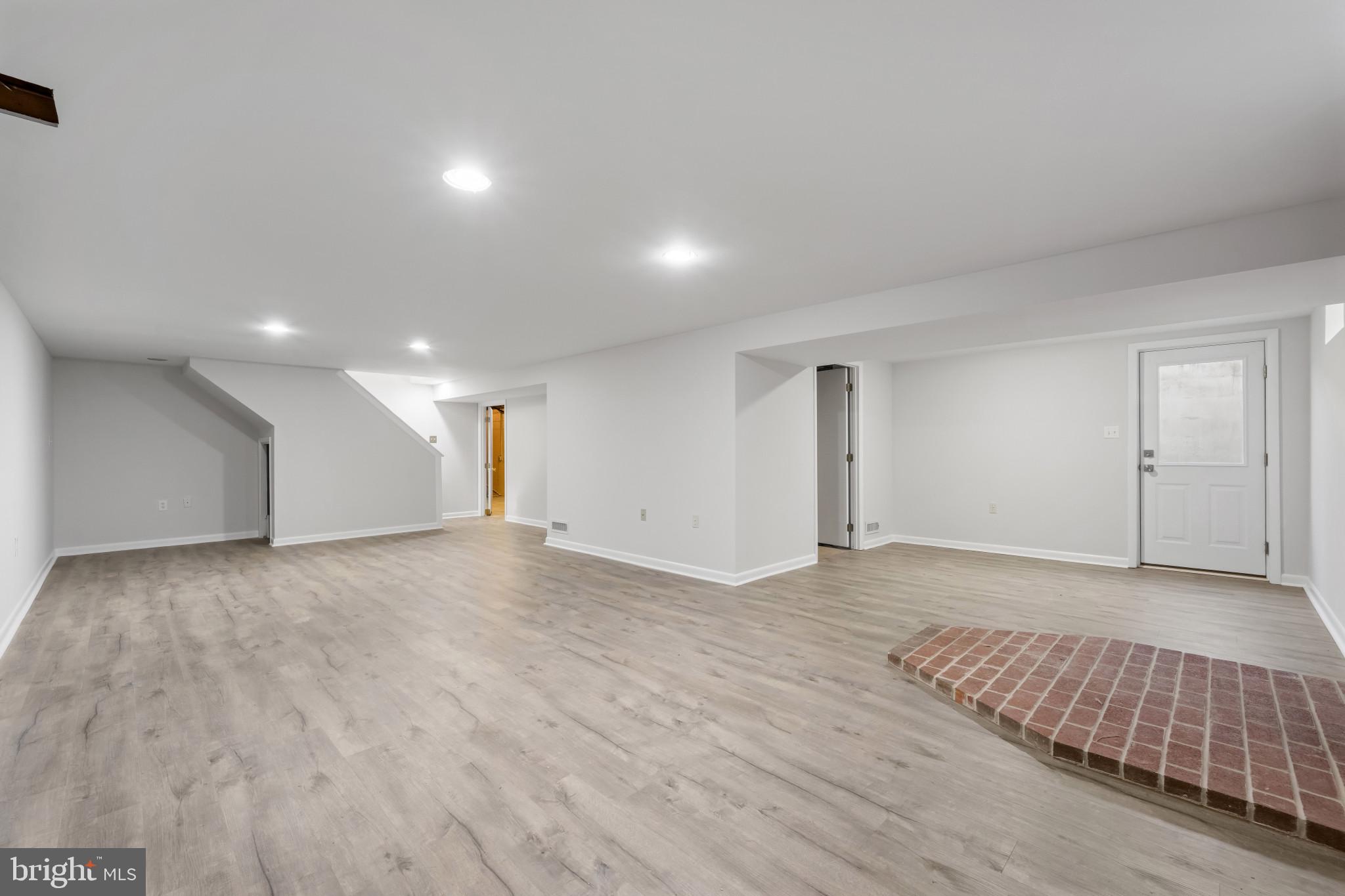 2106 Schuster Road Jarrettsville, MD 21084 - Photo 24 of 28 a view of an empty room with wooden floor and closet