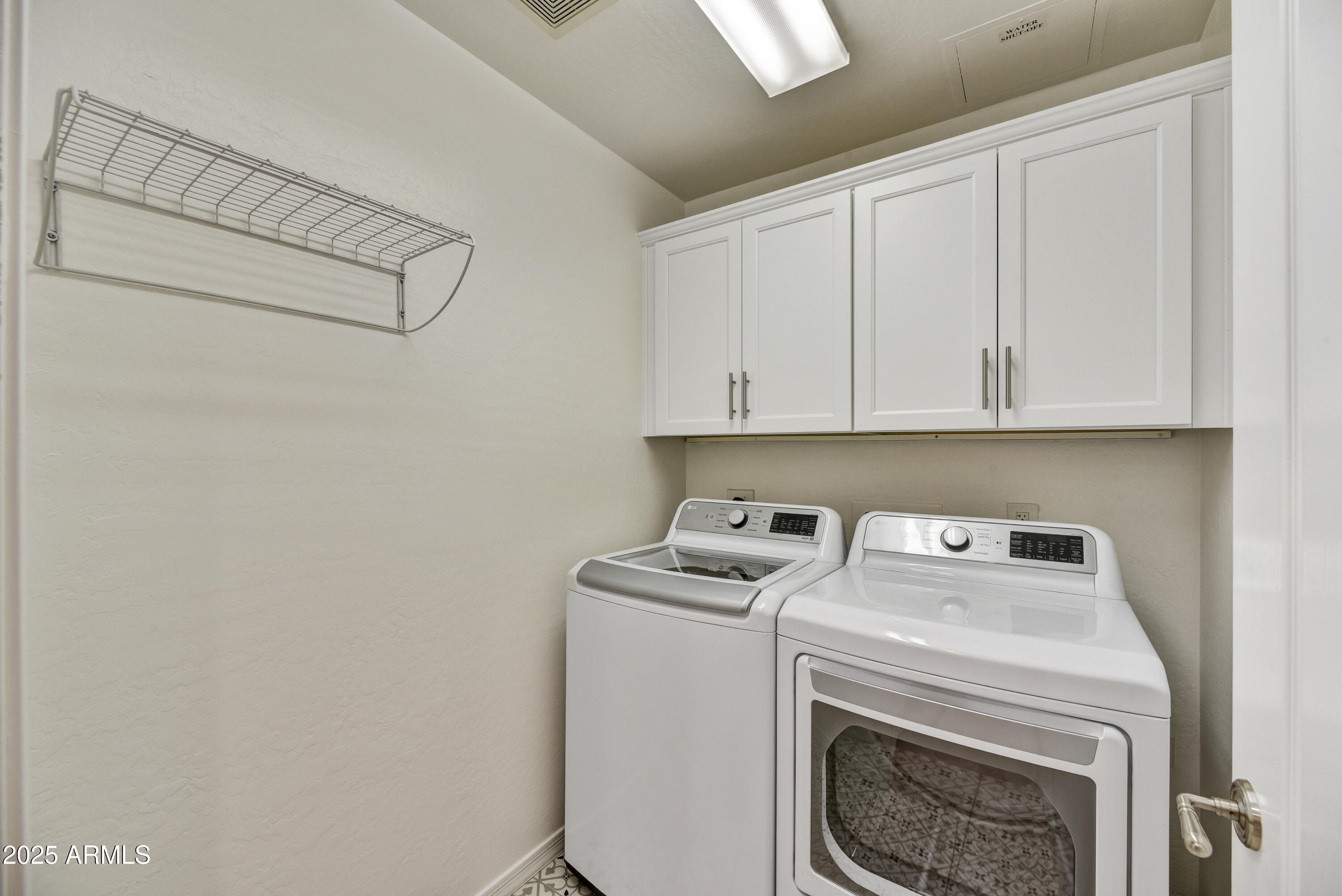 16 West Encanto Boulevard, Unit 22 Phoenix, AZ 85003 - Photo 11 of 34 a utility room with dryer and washer
