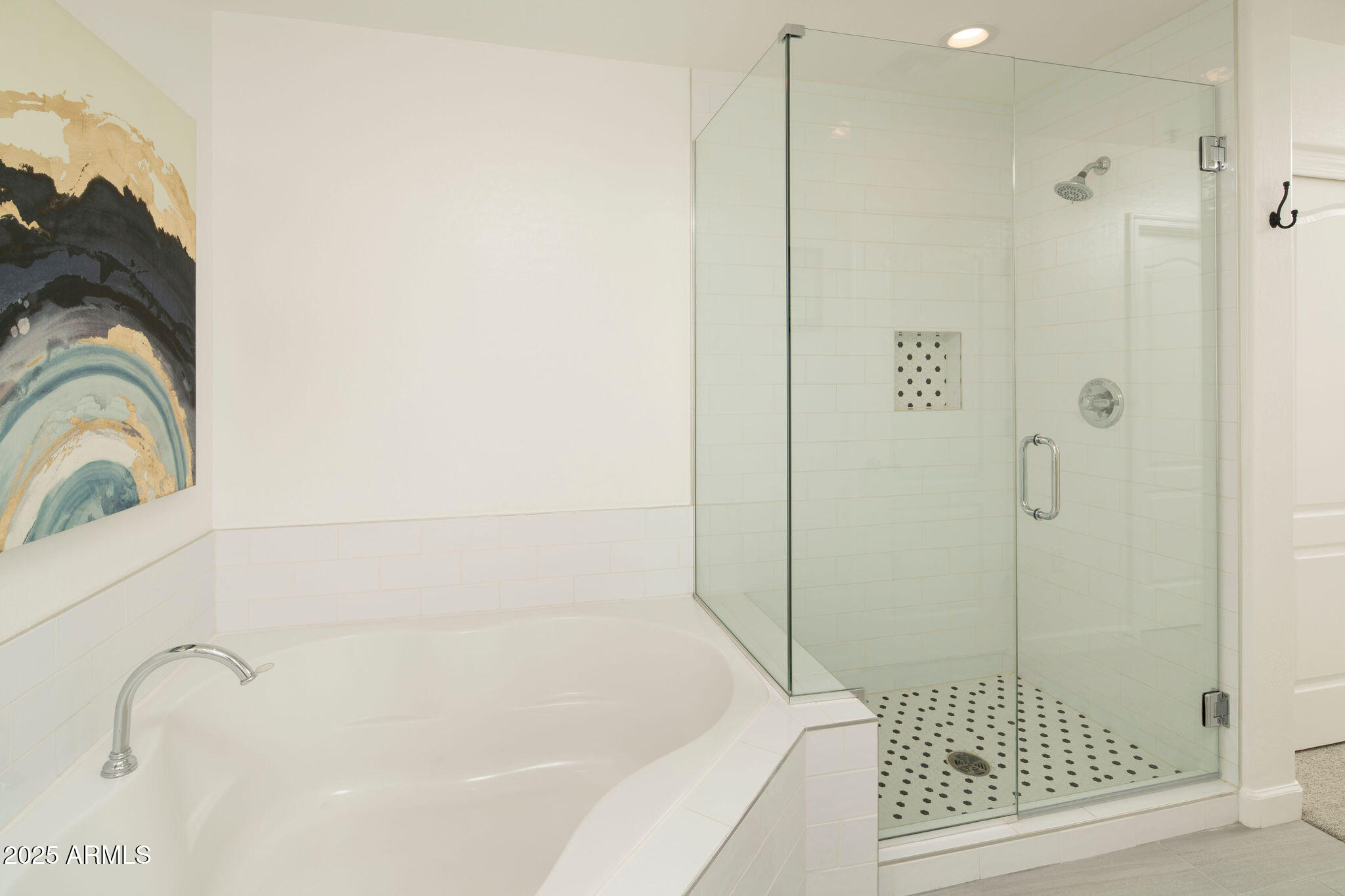 16 West Encanto Boulevard, Unit 22 Phoenix, AZ 85003 - Photo 16 of 34 a bathroom with a bathtub and shower