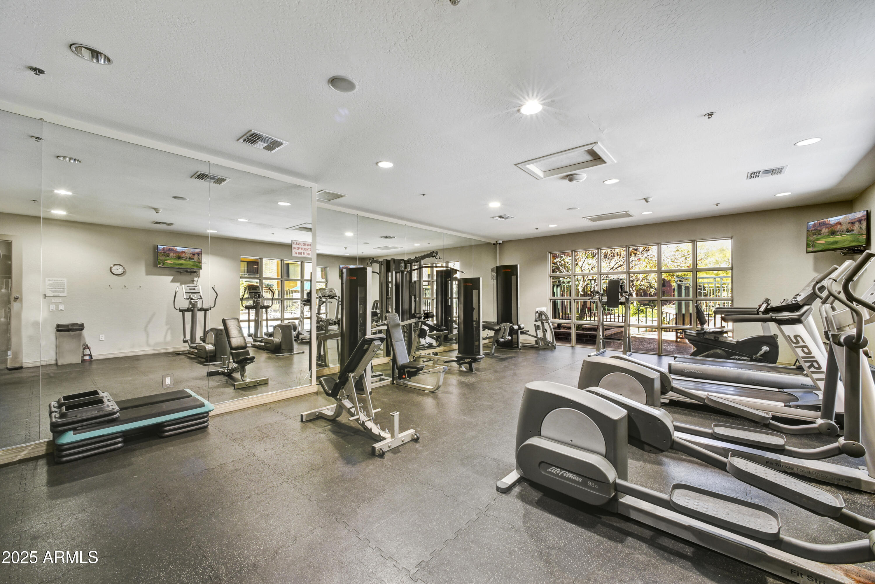 16 West Encanto Boulevard, Unit 22 Phoenix, AZ 85003 - Photo 31 of 34 a view of a room with gym equipment