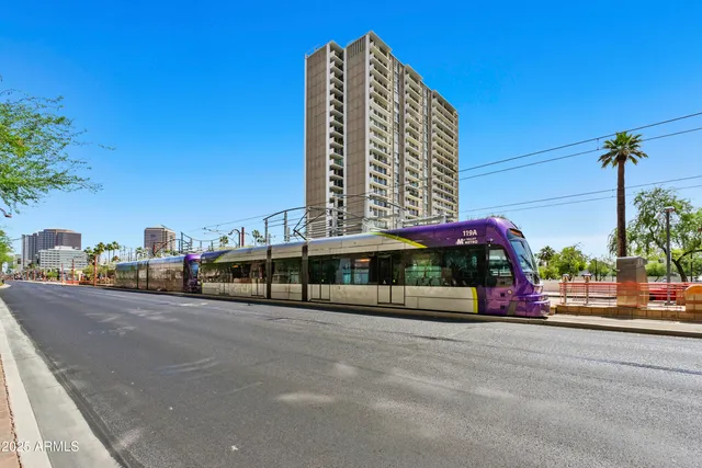 a view of street with tall buildings