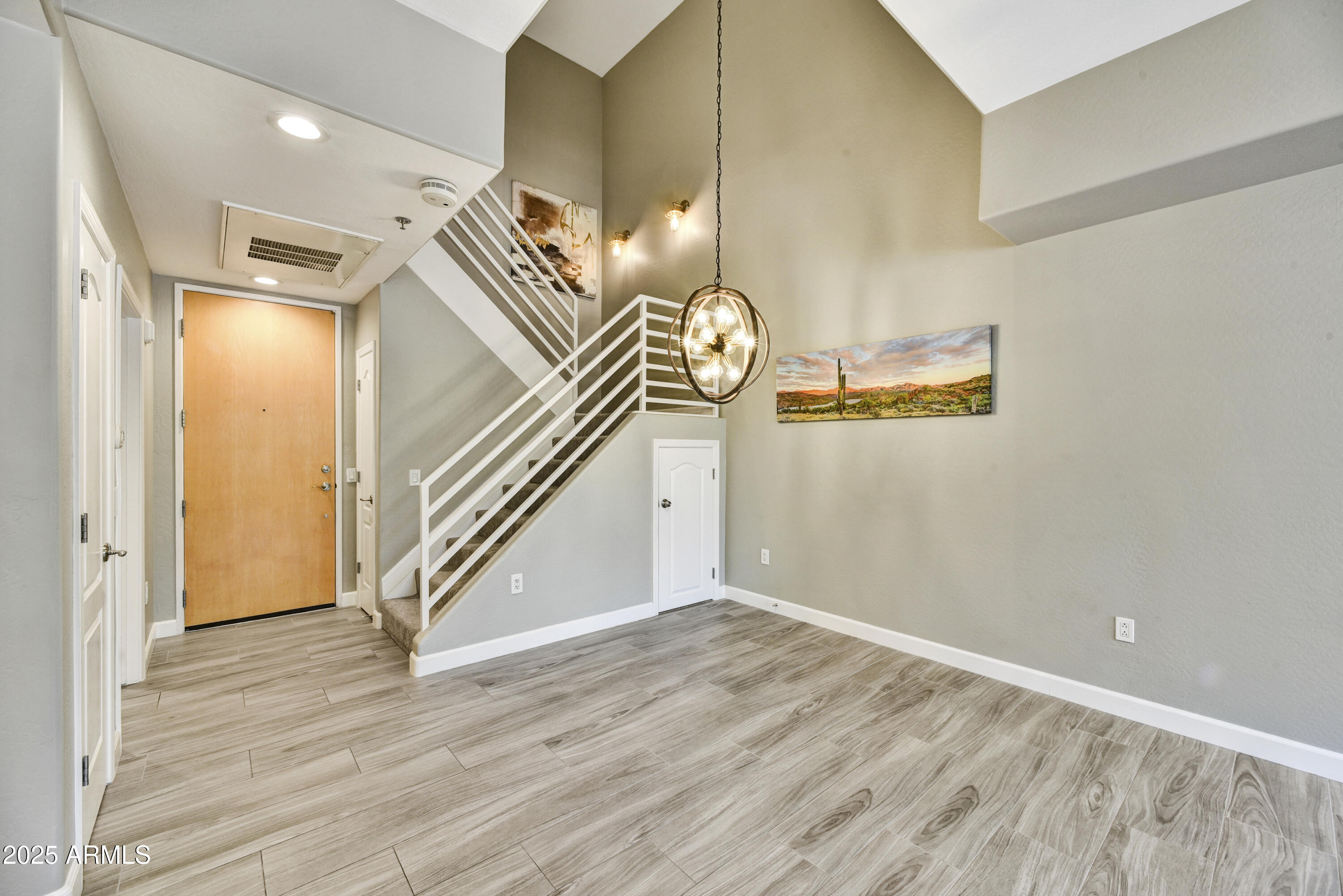 16 West Encanto Boulevard, Unit 22 Phoenix, AZ 85003 - Photo 4 of 34 a view of an entryway with wooden floor