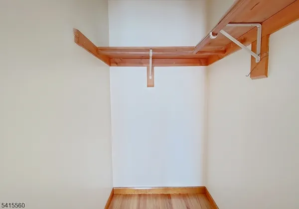 a view of a room with stairs and a window