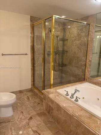 a bathroom with a sink and a shower
