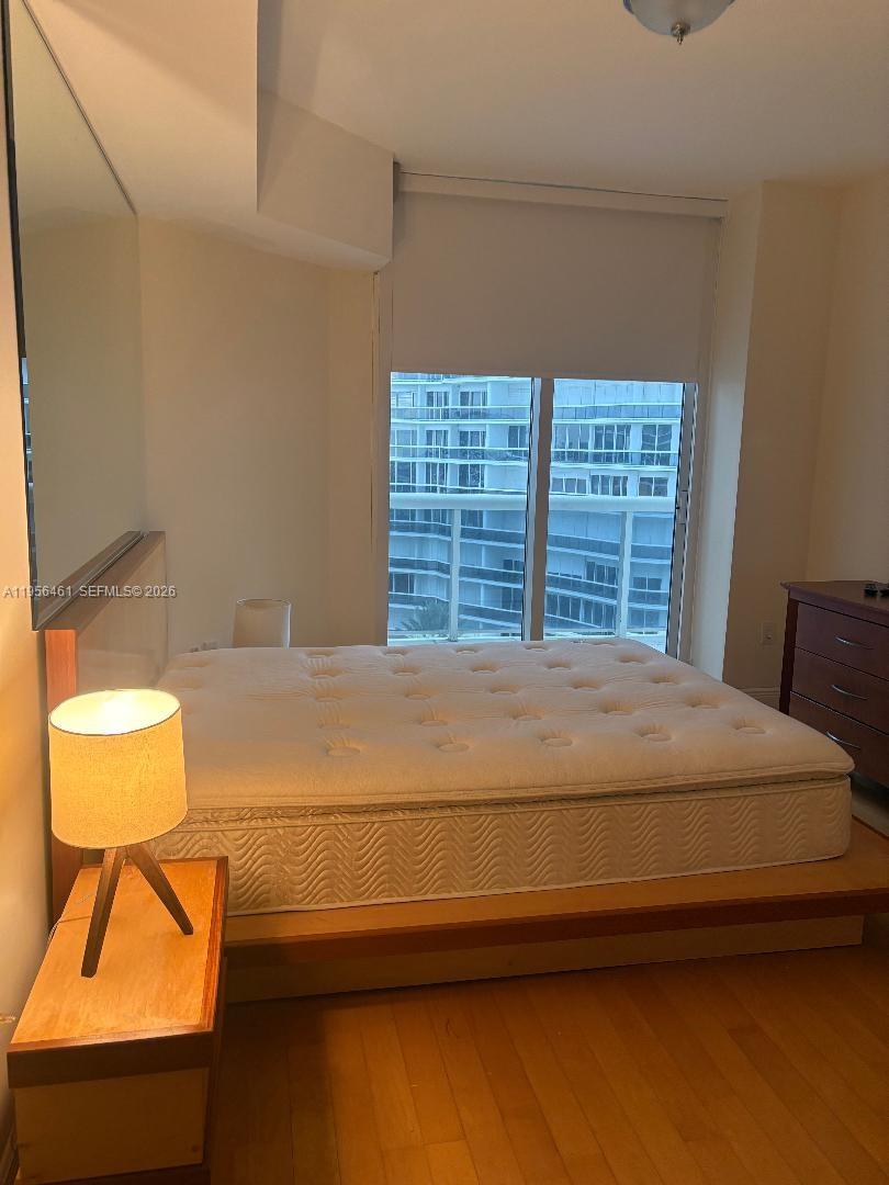 9595 Collins Avenue, Unit N9I Surfside, FL 33154 - Photo 5 of 9 a bedroom with a bed and a window