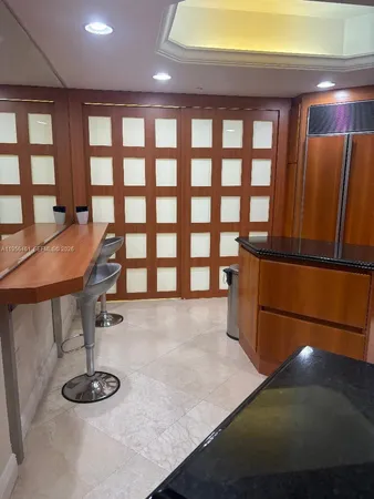 a room with a table and chairs
