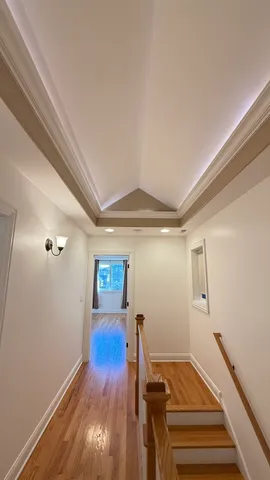 a view of a livingroom with wooden floor