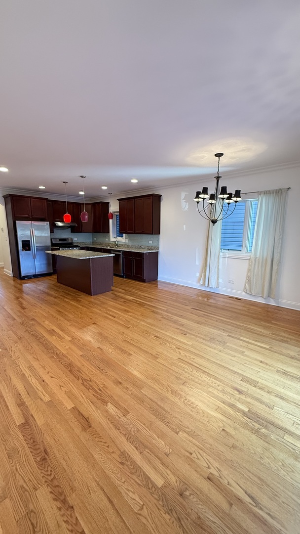 4411 South Wallace Street Chicago, IL 60609 - Photo 6 of 23 a view of a kitchen with a sink