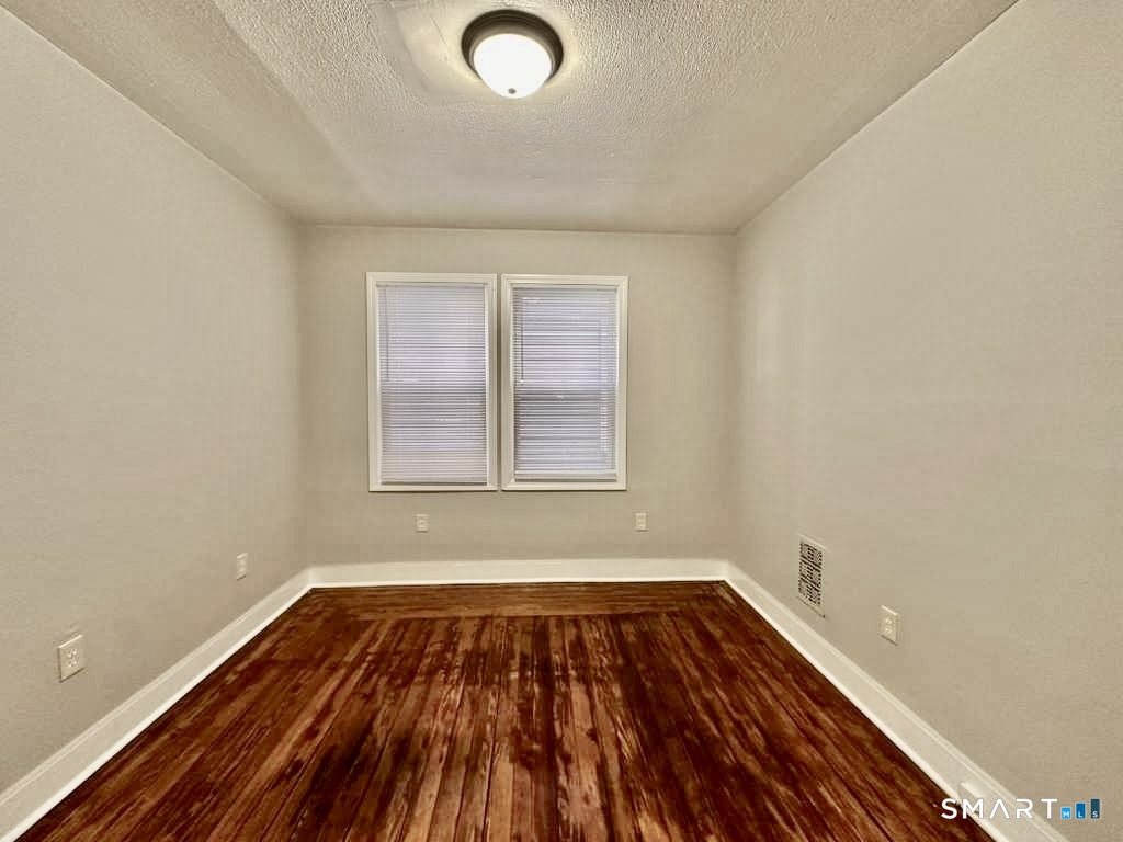 786 George Street New Haven, CT 06511 - Photo 11 of 28 a view of a room with wooden floor and window