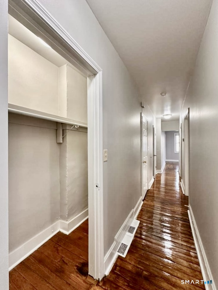786 George Street New Haven, CT 06511 - Photo 15 of 28 a view of a hallway with wooden floor
