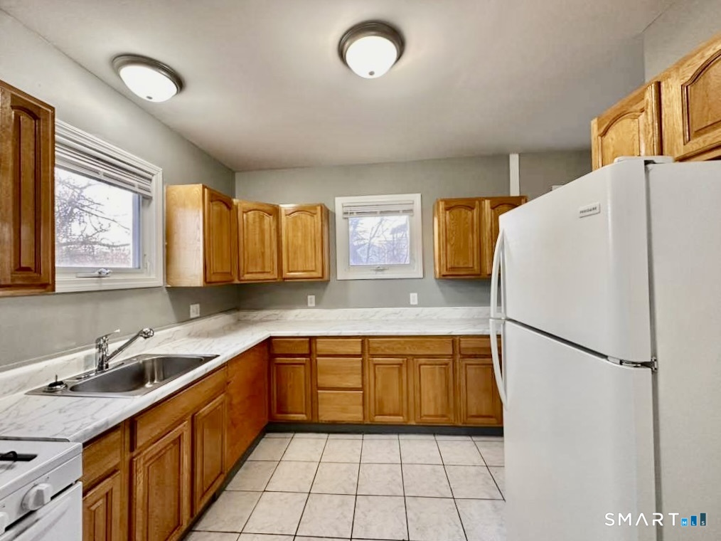 786 George Street New Haven, CT 06511 - Photo 20 of 28 a kitchen with a refrigerator a sink and dishwasher