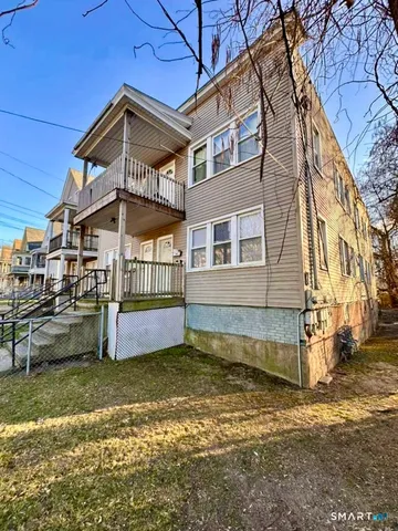 a view of a house with a swimming pool