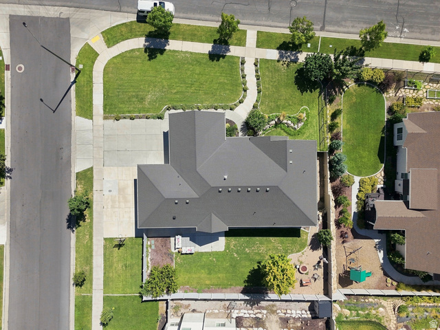 1997 East 600 South Springville, UT 84663 - Photo 10 of 54 Expansive lot with a sizable driveway, manicured front lawn, and established landscaping