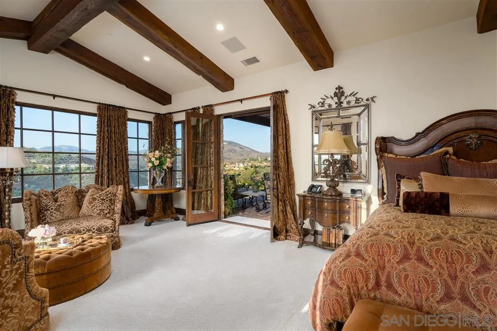 6266 Strada Fragante Rancho Santa Fe, CA 92091 - Photo 17 of 25 a bedroom with furniture and large windows