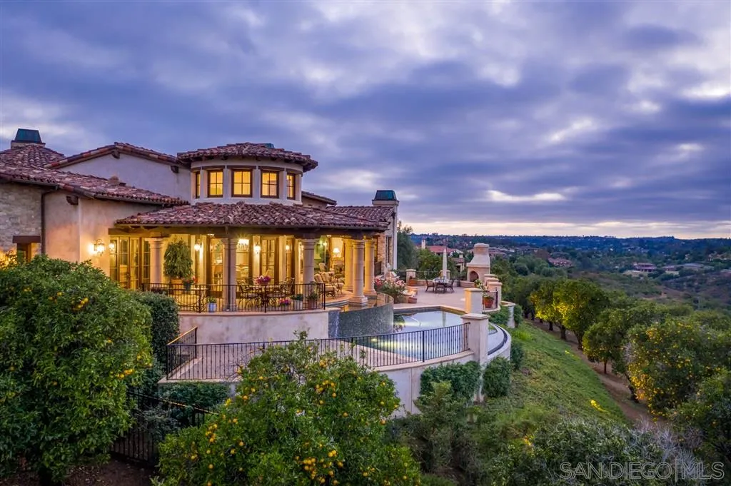 6266 Strada Fragante Rancho Santa Fe, CA 92091 - Photo 3 of 25 a front view of a house with a yard